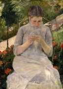 Young girl in the garden woman sewing
