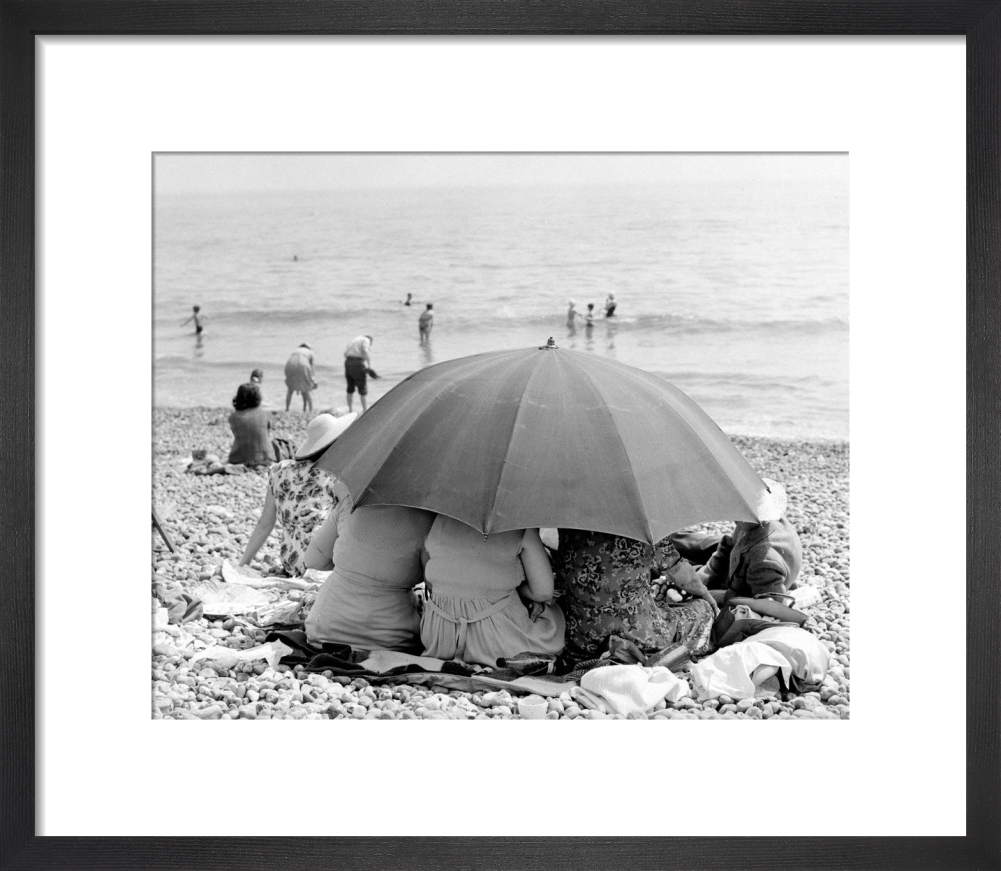 Beach umbrella, 1963 Art Print by Mirrorpix | King & McGaw